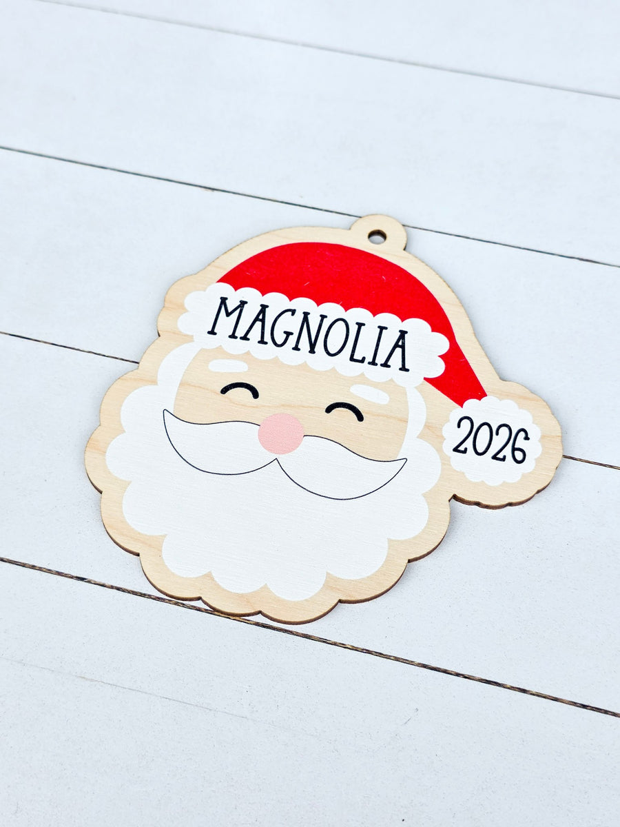 Personalized Santa Christmas ornament with custom name Magnolia and 2026 UV printed on birch wood