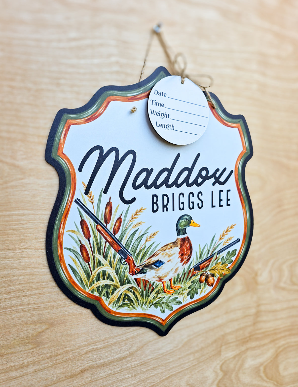 Black green and burnt orange vintage crest border on hunting nursery door hanger