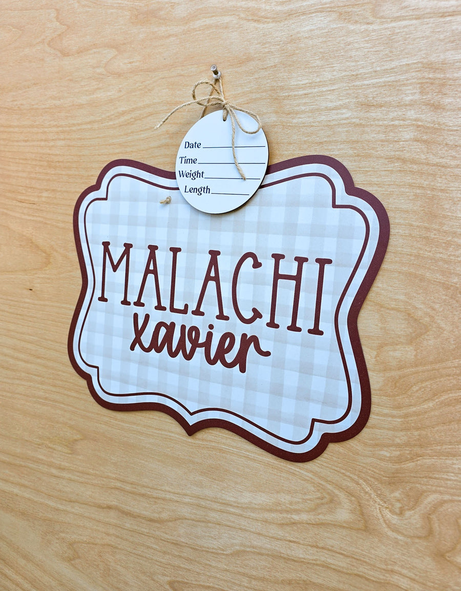 Light neutral gingham pattern with deep burgundy border on personalized baby name sign