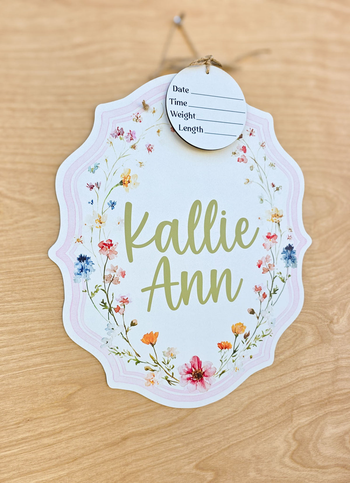 Custom wildflower baby hospital door hanger with pink border and twine