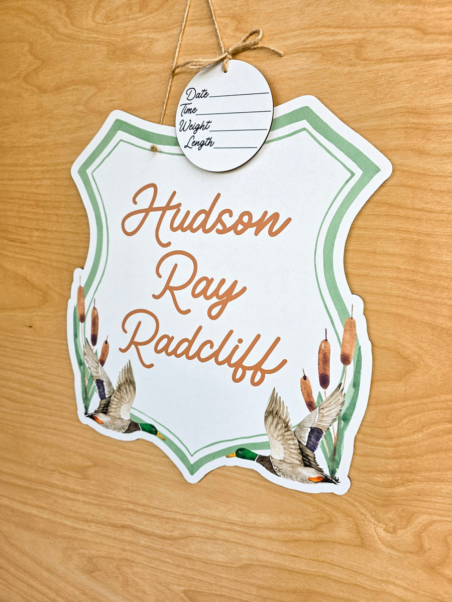 Two flying watercolor mallard ducks on personalized baby hospital door sign